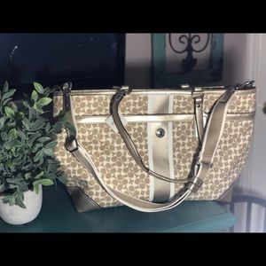 Coach gold diaper bag